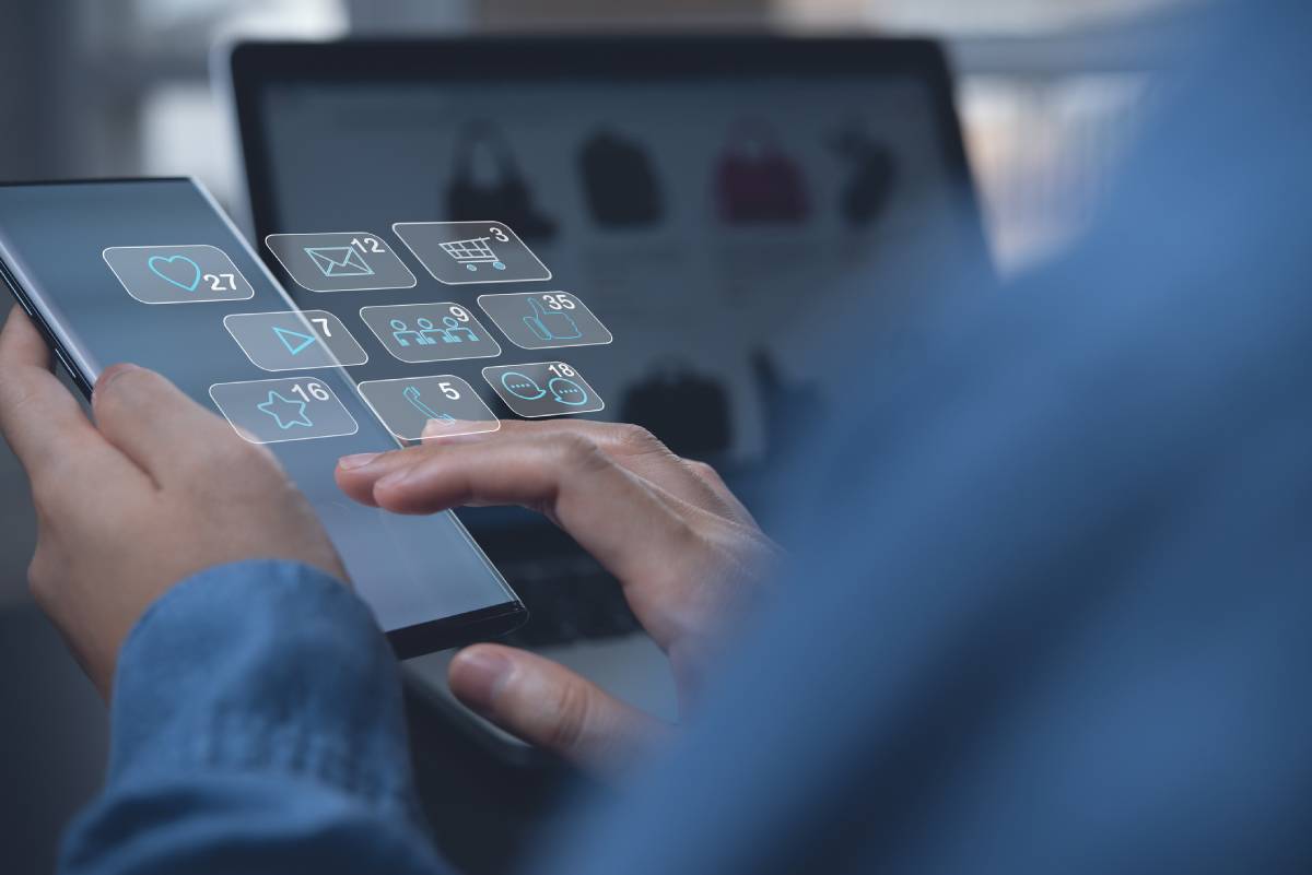 Person using omnichannel messaging strategy for digital marketing.