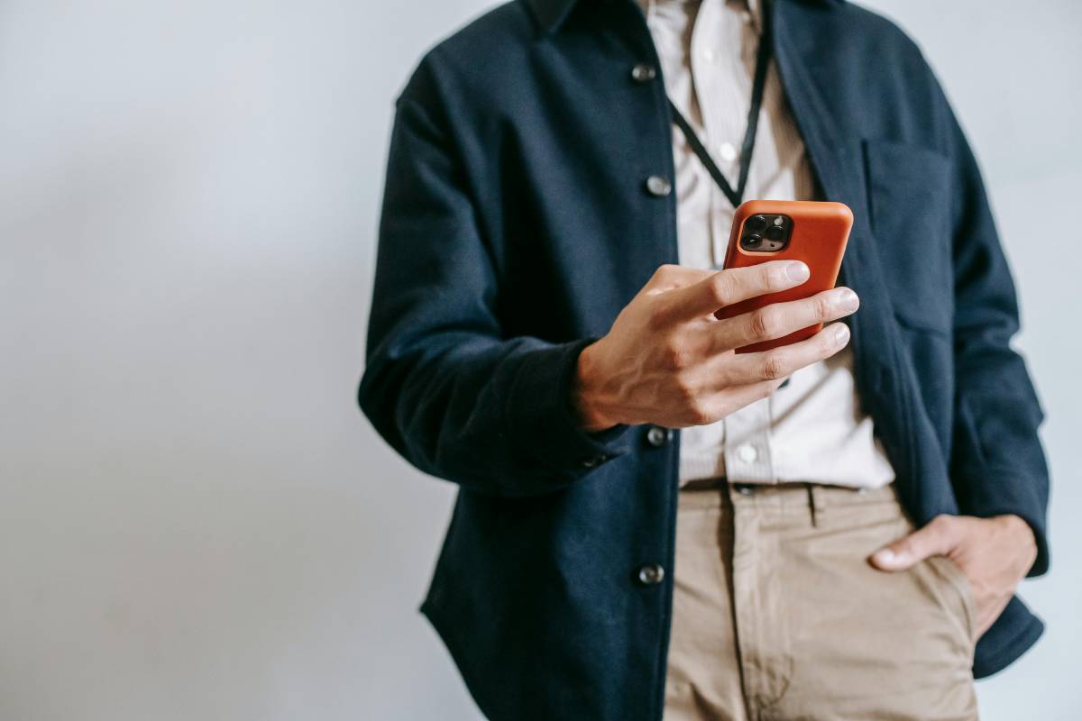 Man holding his phone.